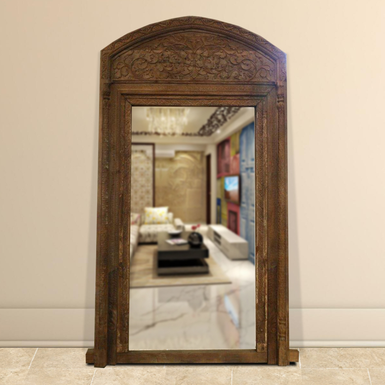 Brody full-length mirror with a sleek wooden frame styled in a modern interior
