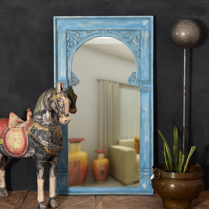 Handcrafted large blue carved wall mirror with bold detailing