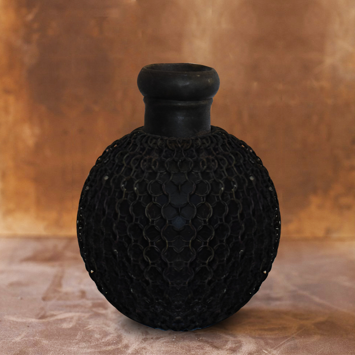 Rustic iron pot as decorative accent for indoor and outdoor decor