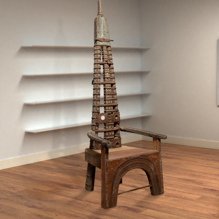 Artistic tall wooden seat with geometric carvings in a luxury interior