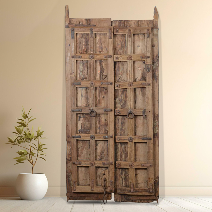 Traditional wooden door panel with carved detailing highlighting heritage-style decor