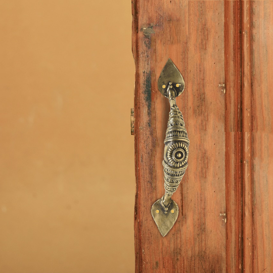 Room setting displaying the Dhokra Door Handle-SHop online at Artisans Rose