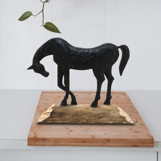 Front view of the Adjo Black Horse Sculpture made of mango wood with natural textures - Artisans Rose