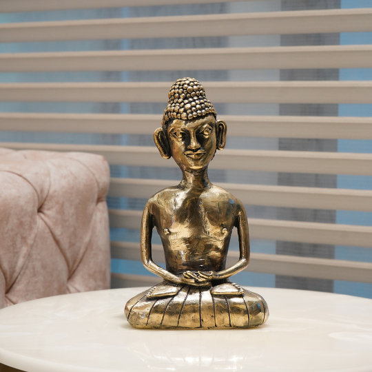 Front view of Dhokra Buddha sculpture with brass finish and gold brass accents – decorative piece from Artisans Rose.