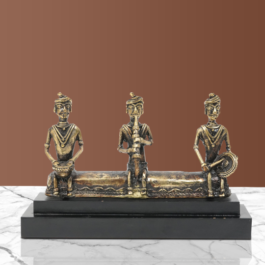 Front view of Dhokra Madia Madin Musician Set in antique gold brass finish, traditional Indian handcrafted decorative sculpture