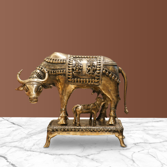 Side view of Dhokra Cow & Calf Set with Base made of reclaimed brass, antique gold finish, decorative sculpture on Artisans Rose.