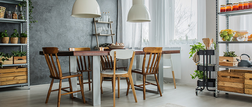 Designer dining chairs creating a warm dining table setting