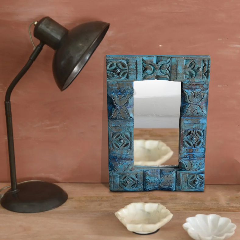 Carved wooden wall mirror with elegant handcrafted detailing
