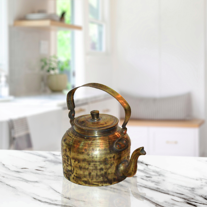 Classic vintage brass tea kettle for rustic kitchen display