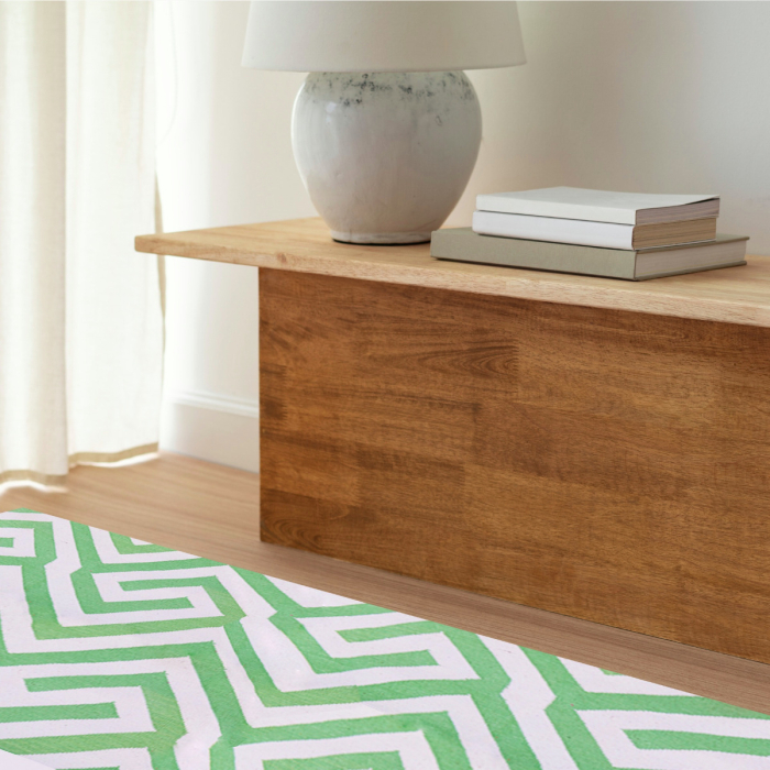 Green and white patterned dhurry rug for living room decor