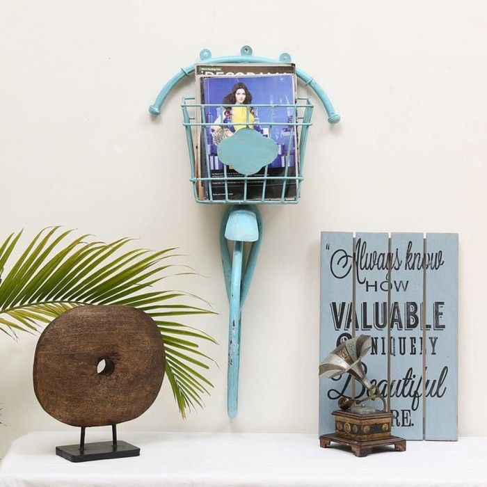 Travis blue bicycle wall magazine rack combining storage with bicycle-themed design